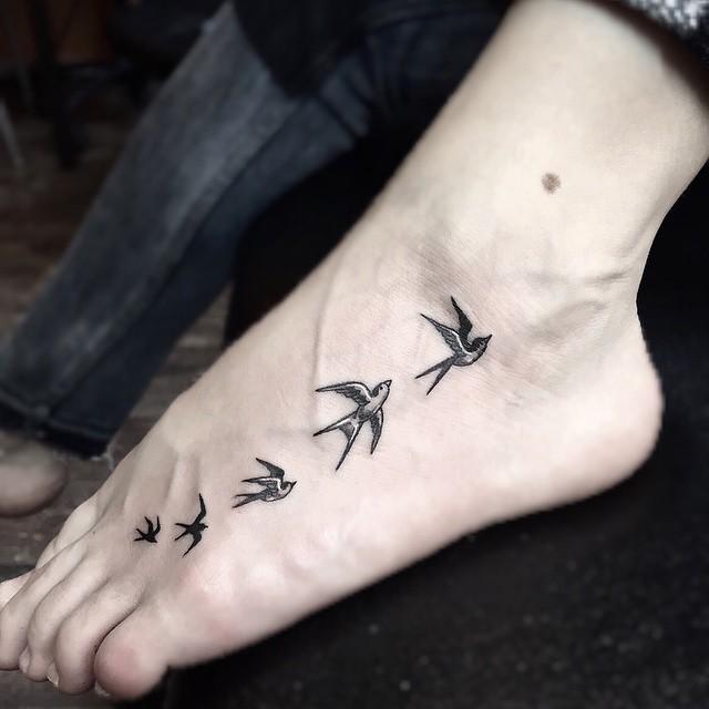 tatouage pied 53