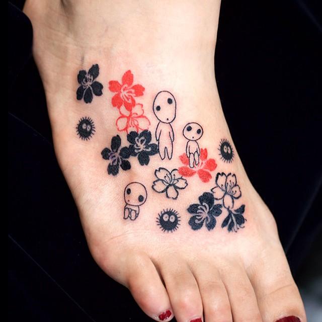 tatouage pied 69