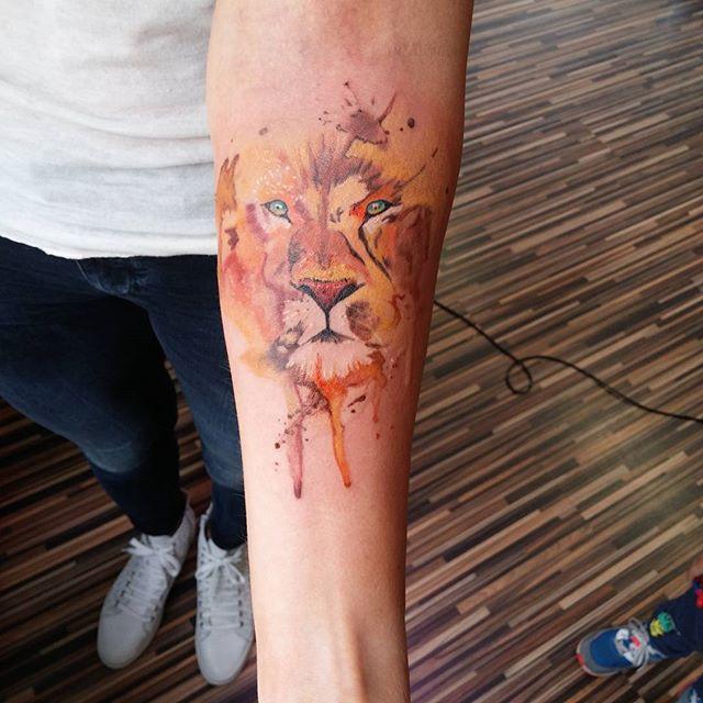 tatouage lion 63