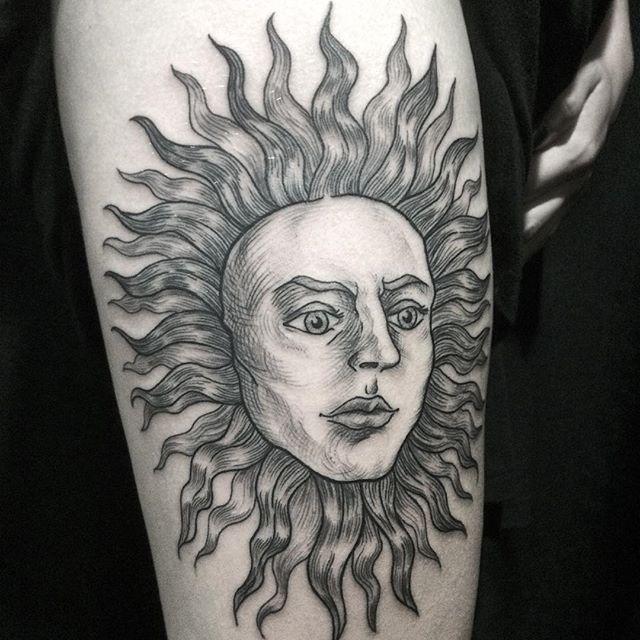 tatouage soleil 69
