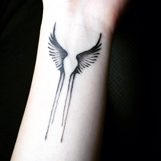 tatouage ailes 107