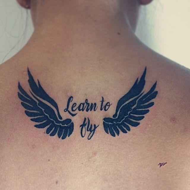 tatouage ailes 65