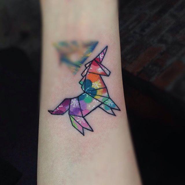 tatouage licorne 97