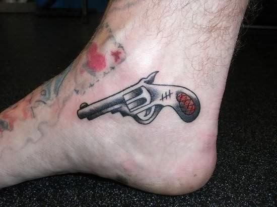 63 Tatouages de pistolets et de revolvers