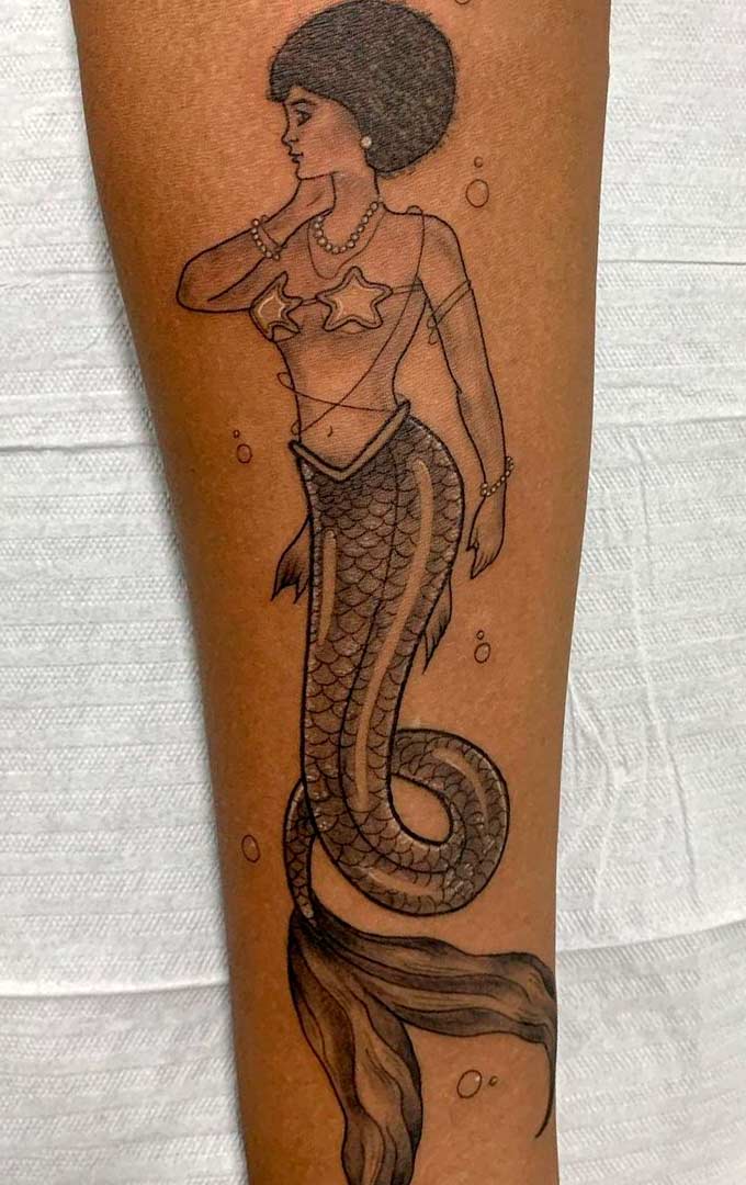 tatouage de sirene sur femme 15