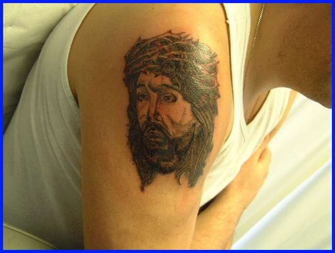 tatuaggio religione 1014