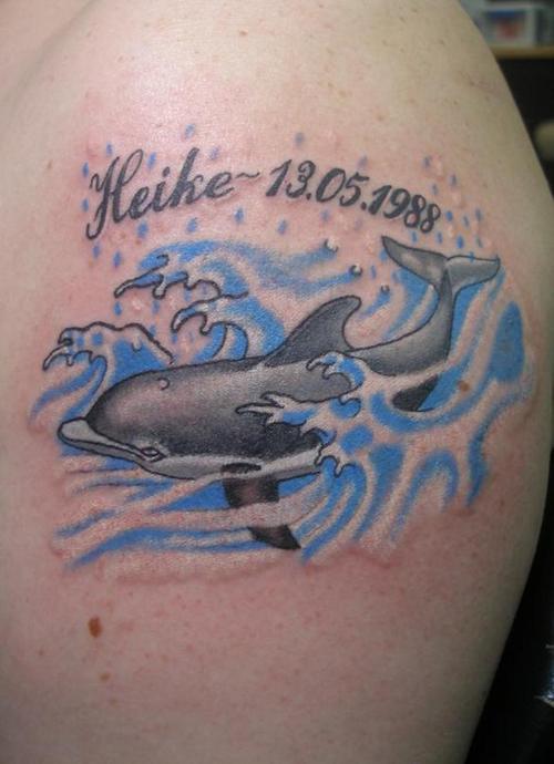 tatuaggio delfino 56