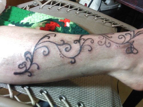 tatuaggio pianta rampicante 54