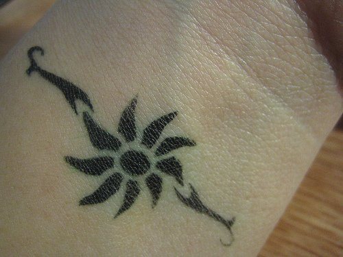 tatuaggio sole 10