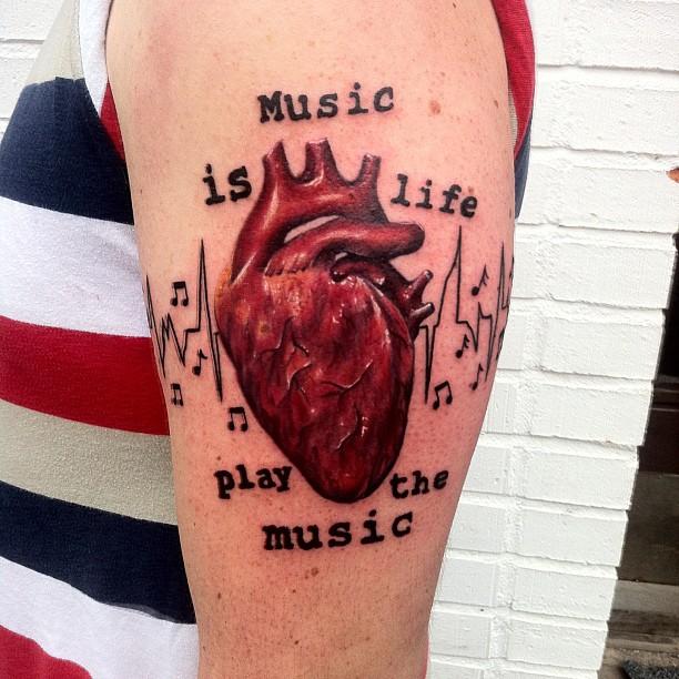 tatuaggio nota musicale 105