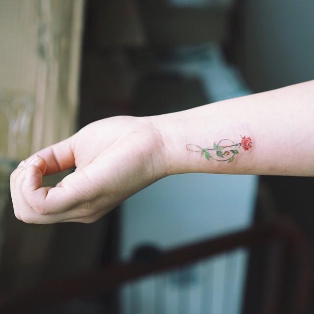 tatuaggio nota musicale 111