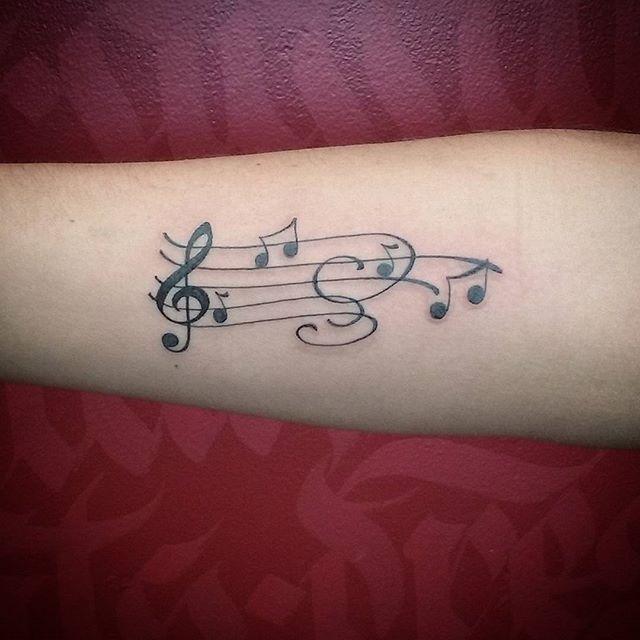tatuaggio nota musicale 117