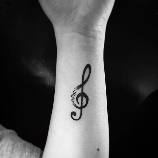 tatuaggio nota musicale 21