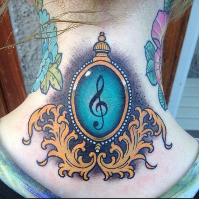 tatuaggio nota musicale 33
