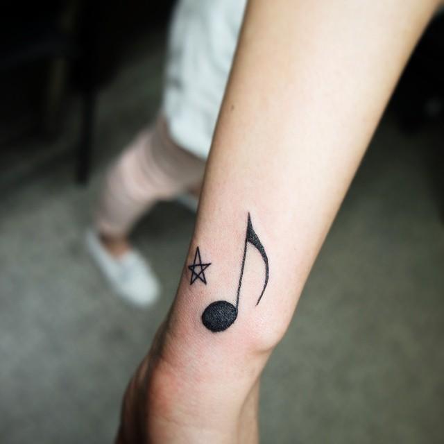 tatuaggio nota musicale 49