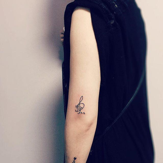 tatuaggio nota musicale 93
