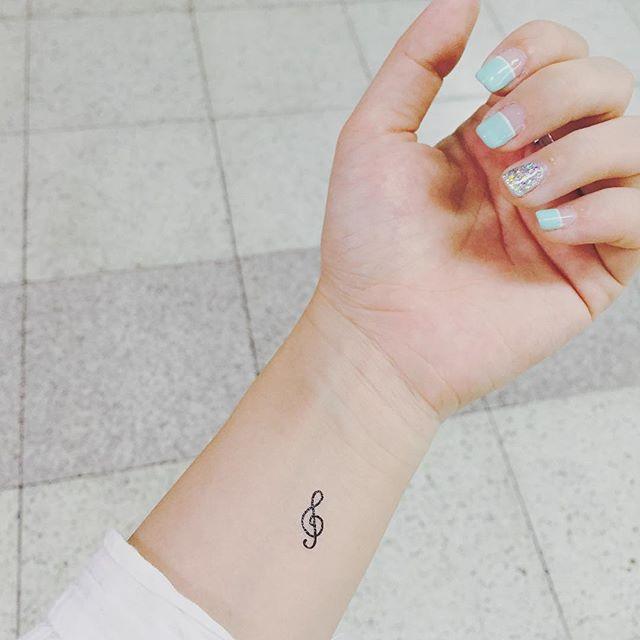 tatuaggio nota musicale 95