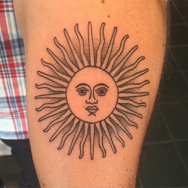 tatuaggio sole 115