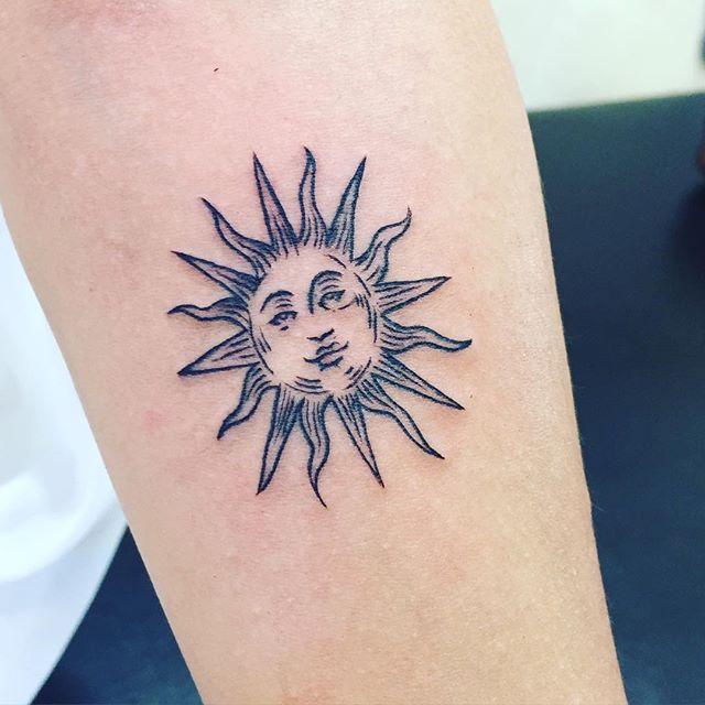 tatuaggio sole 63