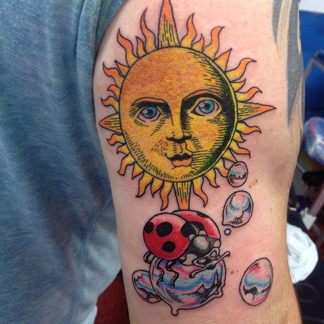 tatuaggio sole 67