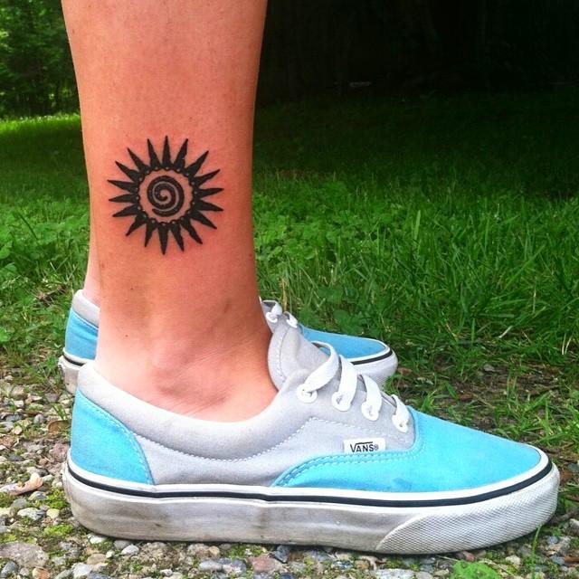 tatuaggio sole 97