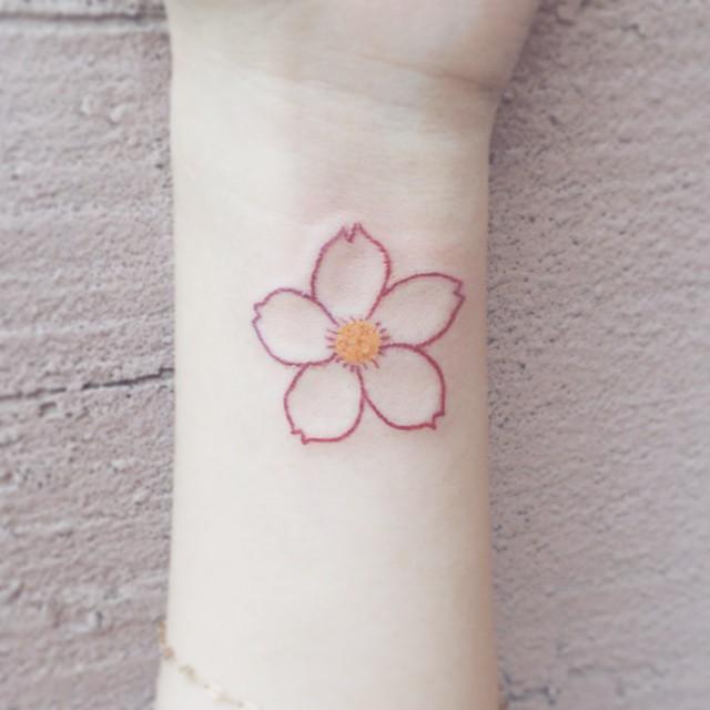 tatuaggio fiore ciliegio sakura 29