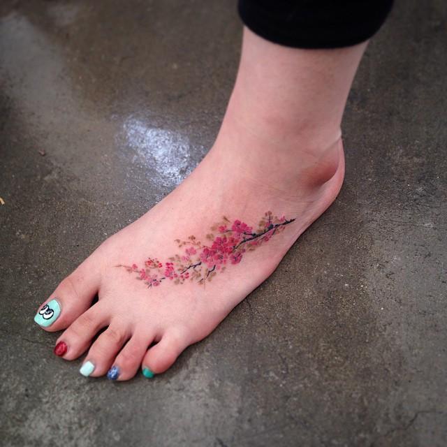 tatuaggio fiore ciliegio sakura 33