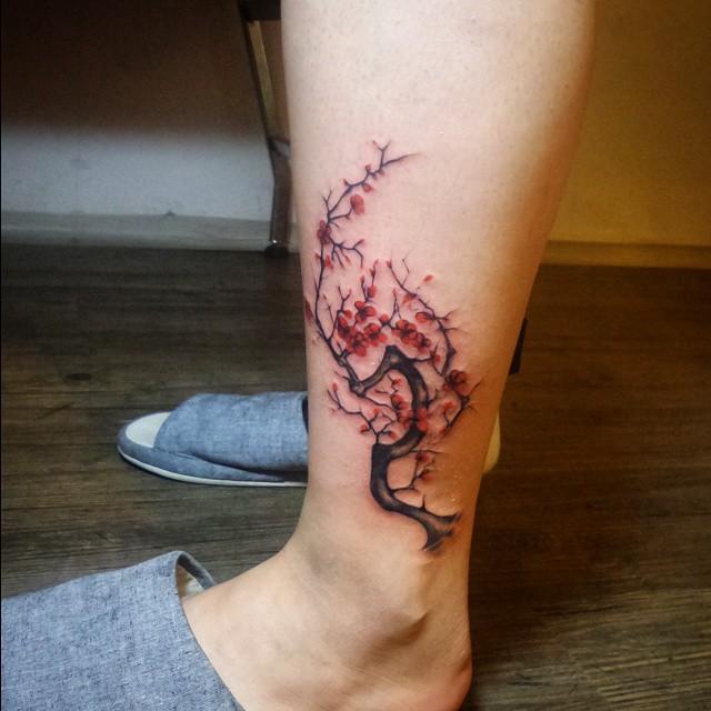 tatuaggio fiore ciliegio sakura 65