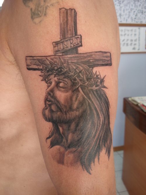 16 tatuaggi religiosi